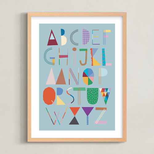 This is a sea foam kids wall art by lulu and isabelle called the most colorful alphabet