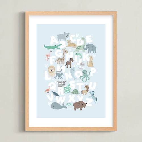 This is a white art by Jessie Steury called wild animal alphabet