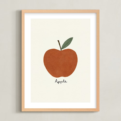 This is a fuji red nursery wall art with standard by Betsy Siber called round fruit duo 1