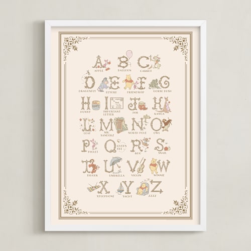 This is a beige disney art by Teju Reval called disney's pooh alphabet