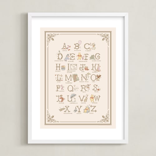 This is a beige disney art by Teju Reval called disney's pooh alphabet