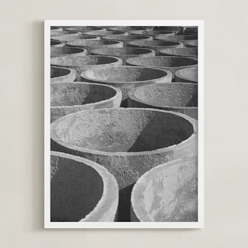 This is a stone art by Alaric Yanos called concrete cylinders