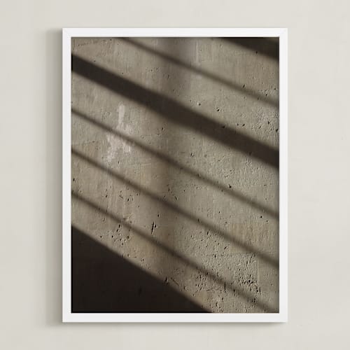 This is a cement art by Eric Clegg called shadow and light