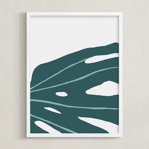 This is a teal art by Alicia Schultz called monstera abstract