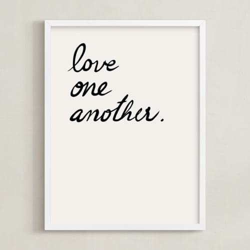 This is a white art by Maja Cunningham called love one, love all