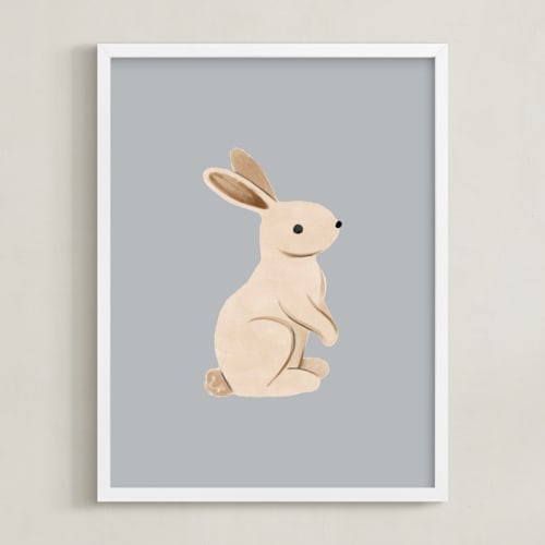 This is a blue kids wall art by Vivian Yiwing called baby rabbit