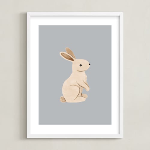 This is a blue kids wall art by Vivian Yiwing called baby rabbit
