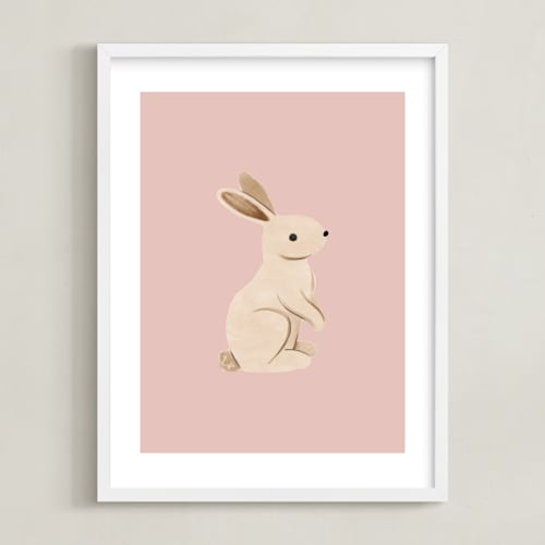 This is a pink kids wall art by Vivian Yiwing called baby rabbit