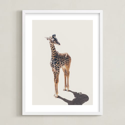 This is a safari kids wall art by Kamala Nahas called baby giraffe