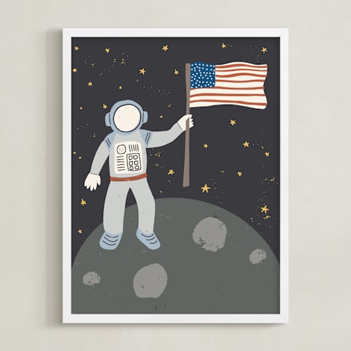 This is a muted blue kids wall art by Maggie Unruh called up in space astronaut