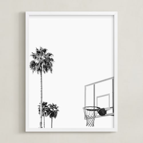 This is a white art by Irene Suchocki called hoops and palms