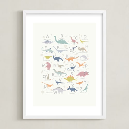 This is a white art by Teju Reval called alphabet dinos