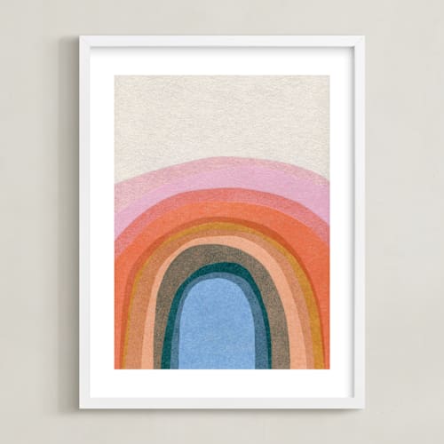 This is a rainbow nursery wall art by Carrie Moradi called rainbow hill