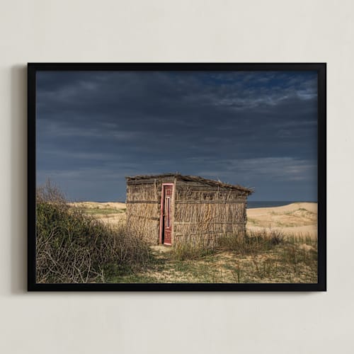 This is a tan art by Lucia Coppola called the ocean shed