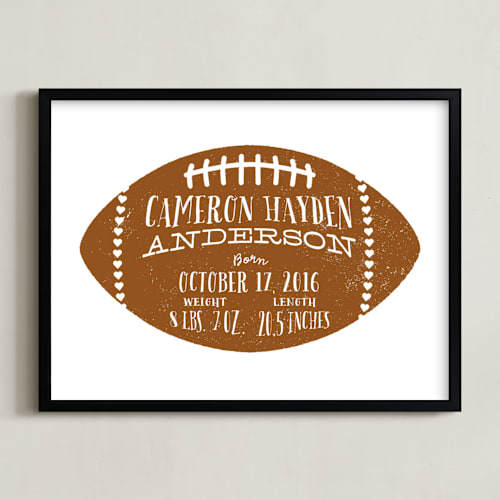 This is a leather personalized art for kids by Laura Bolter called football stats