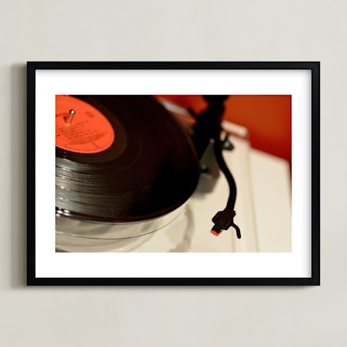 This is a retro red kids wall art by Jonathan Brooks called put the needle on the record