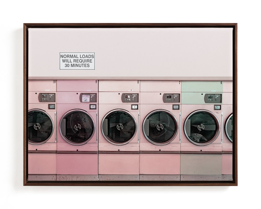 This is a vermillion art by Maja Cunningham called at the laundromat