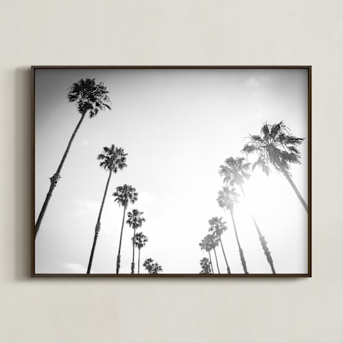 This is a black art by Lauren Armellini called california palms