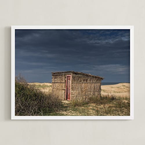 This is a tan art by Lucia Coppola called the ocean shed