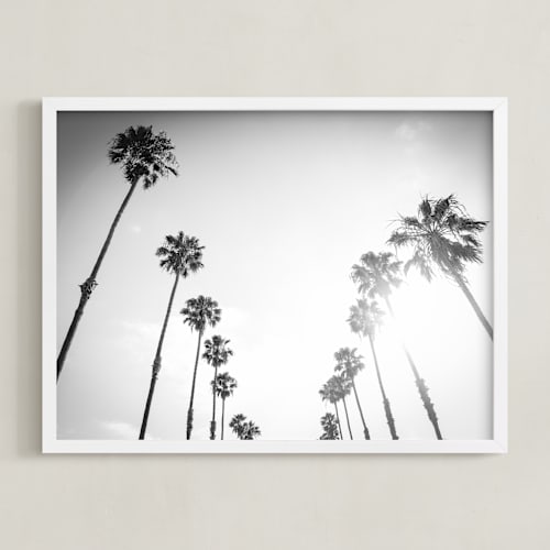 This is a black art by Lauren Armellini called california palms