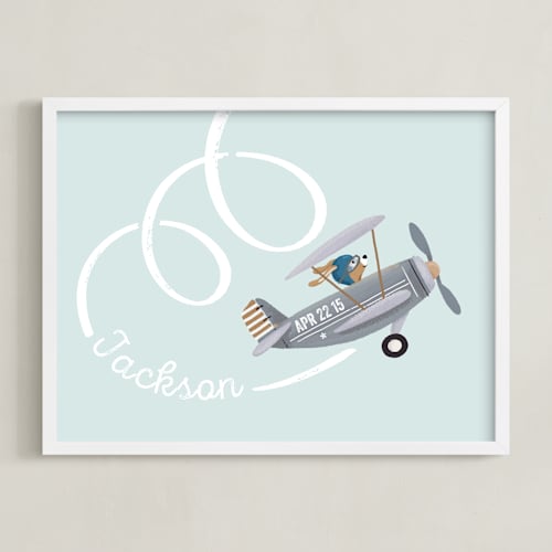 This is a milky blue nursery wall art by Leia Matt called aerobatics