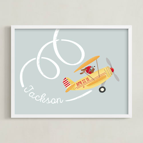 This is a vintage yellow nursery wall art by Leia Matt called aerobatics