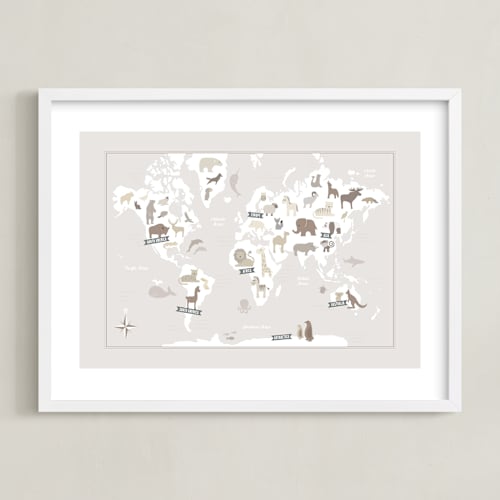 This is a beige nursery wall art by Jessie Steury called animal world map