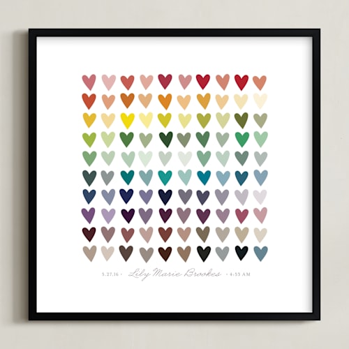 This is a rainbow nursery wall art by InkDot called paper hearts