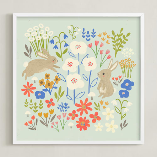 This is a seafoam blue kids wall art by Anne Lehman Stolpe called bunnies in the garden