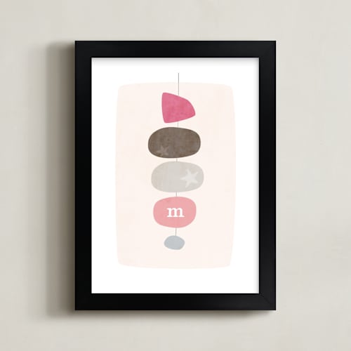 This is a pink nursery wall art by Stacey Meacham called mid-century monogram