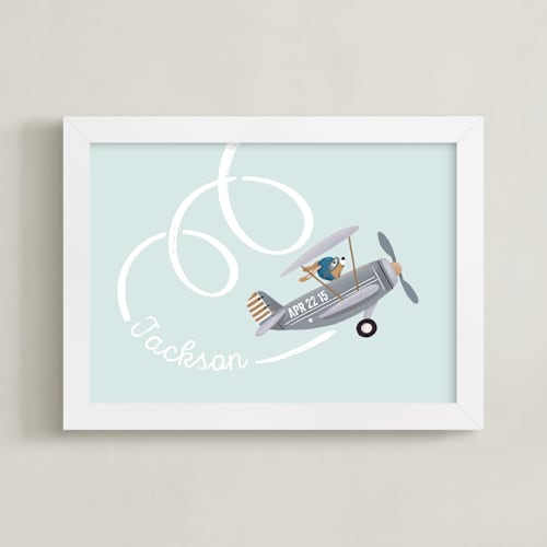 This is a milky blue nursery wall art by Leia Matt called aerobatics