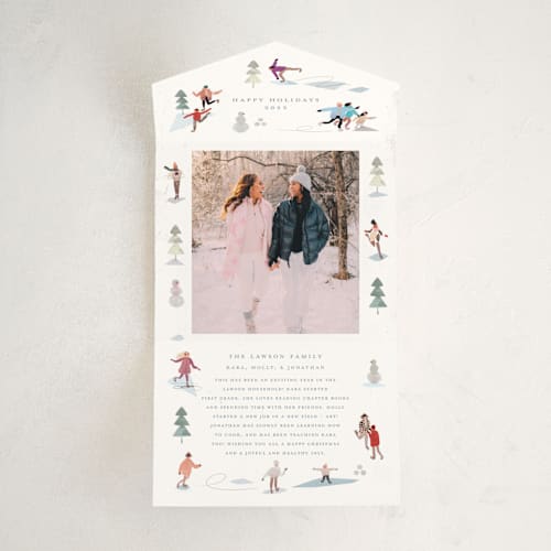 This is a ice all in one holiday cards with standard by Morgan Ramberg called skate! printing on value cover in all-in-one
