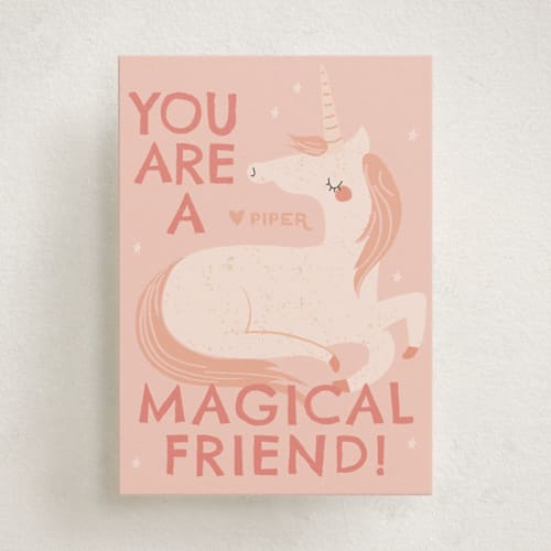 This is a peach kids valentines day cards with standard by Angela Thompson called unicorn magic printing on signature in standard