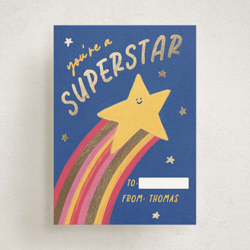 This is a blue slate kids valentines day cards with foil pressed by Sabrina Excene called superstar valentine printing on signature in standard
