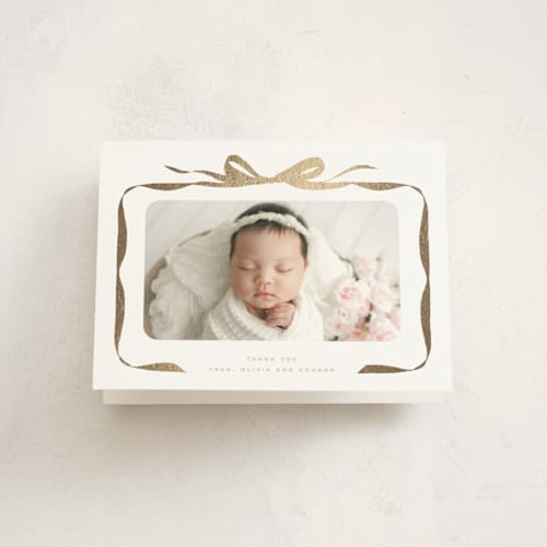 This is a poppy baby thank you cards with foil pressed by Olivia Kanaley Inman called bow printing on strathmore in standard