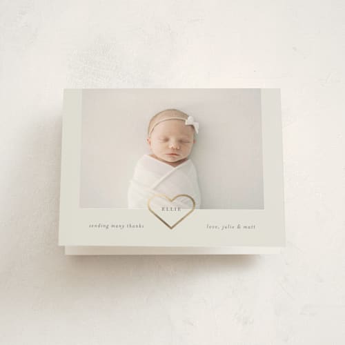 This is a cotton baby thank you cards with foil pressed by Stephanie Heinrich Godbout called golden heart printing on strathmore in standard