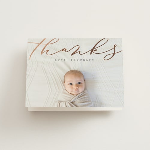 This is a charcoal baby thank you cards with foil pressed by Erica Krystek called welcome ribbon printing on strathmore in standard