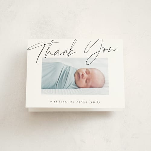 This is a noir baby thank you cards with standard by AK Graphics called simply printing on strathmore in standard