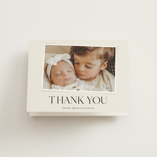 This is a cream baby thank you cards with standard by Jessica Williams called petite introduction printing on strathmore in standard