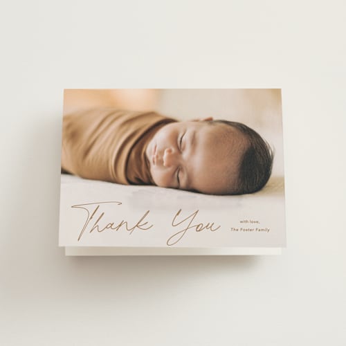 This is a rust baby thank you cards with standard by Stacey Meacham called swaddle printing on strathmore in standard