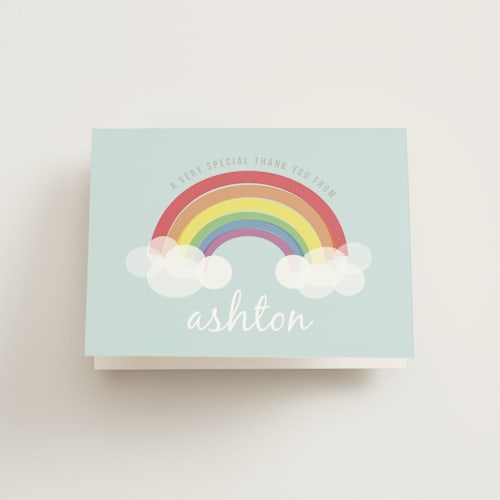 This is a soft teal kids thank you cards with standard by Angela Garrick called rainbow celebration printing on strathmore in standard