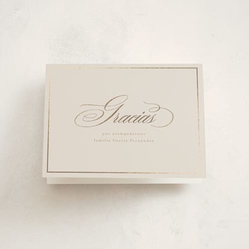 This is a cream graduation thank you cards with foil pressed by Tamara Hilje called gilded printing on strathmore in standard