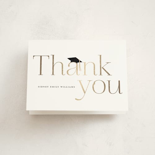 This is a cotton graduation thank you cards with foil pressed by Stacey Meacham called cap and year printing on strathmore in standard