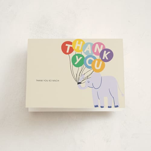 This is a cream baby shower thank you cards with standard by Harriet Richter called elephant parade printing on strathmore in standard