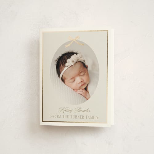 This is a cashmere baby thank you cards with foil pressed by Erin German called tied with a bow printing on strathmore in standard