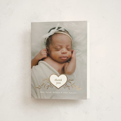 This is a snow baby thank you cards with foil pressed by letterfix called heart crest printing on strathmore in standard