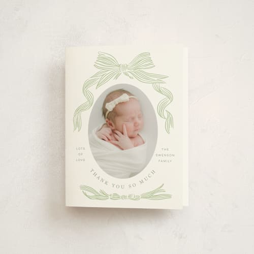 This is a mint baby thank you cards with standard by Stephanie Hawkes called ribbon bow frame printing on strathmore in standard