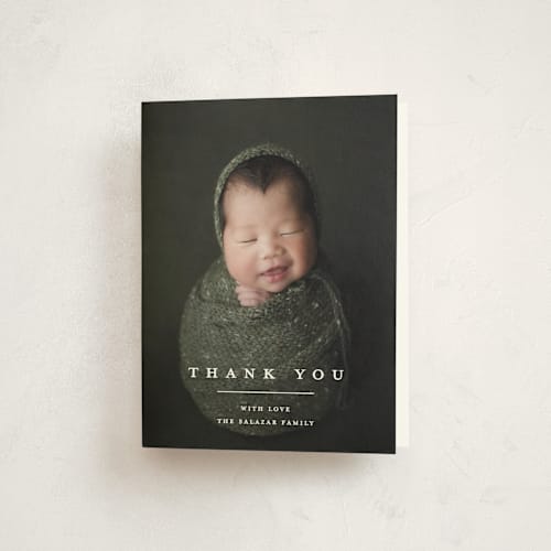 This is a vanilla baby thank you cards with standard by Pixel and Hank called primary printing on strathmore in standard
