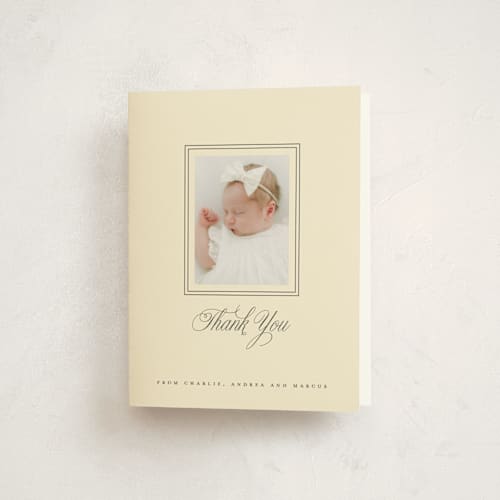 This is a creme baby thank you cards with standard by mo kelley called classical border printing on strathmore in standard