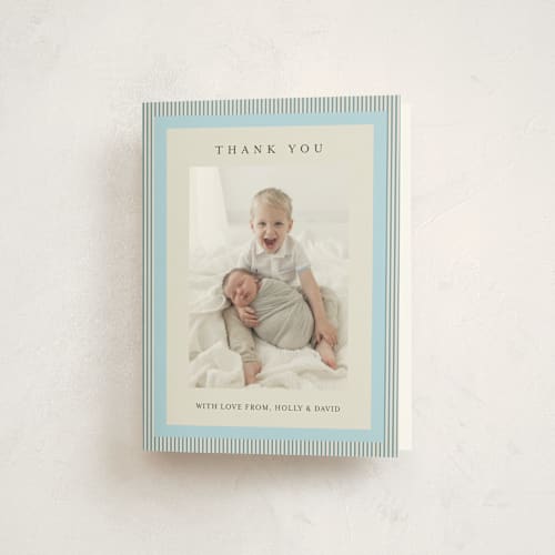 This is a powder blue baby thank you cards with standard by Jackie Crawford called modern striped frame printing on strathmore in standard